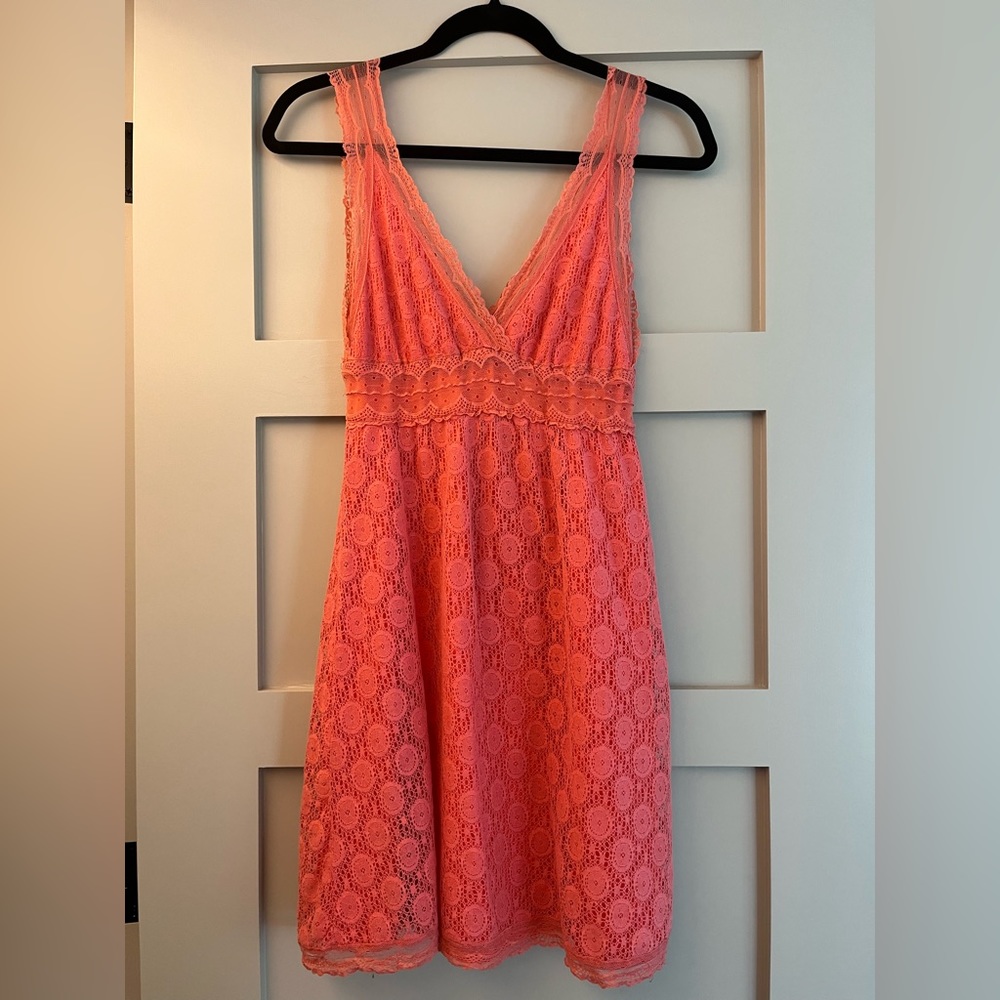 peach colour lace dress. size small.